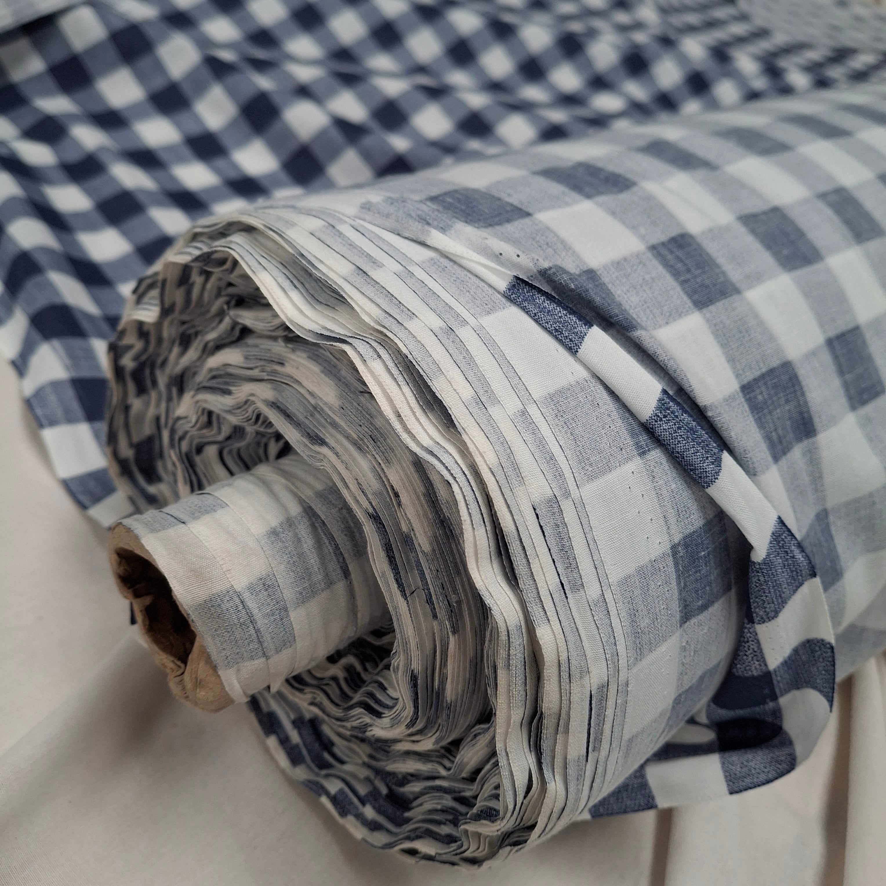 NEW Blue and White Polycotton Checked Fabric 145 cm wide

NEW cut from unused surplus roll 

Very lightweight curtain fabric weighs approx 48 grams per metre 

RRP £8.99 metre 

Selling at £3.5 metre 

Ideal for many sewing projects including curtains and