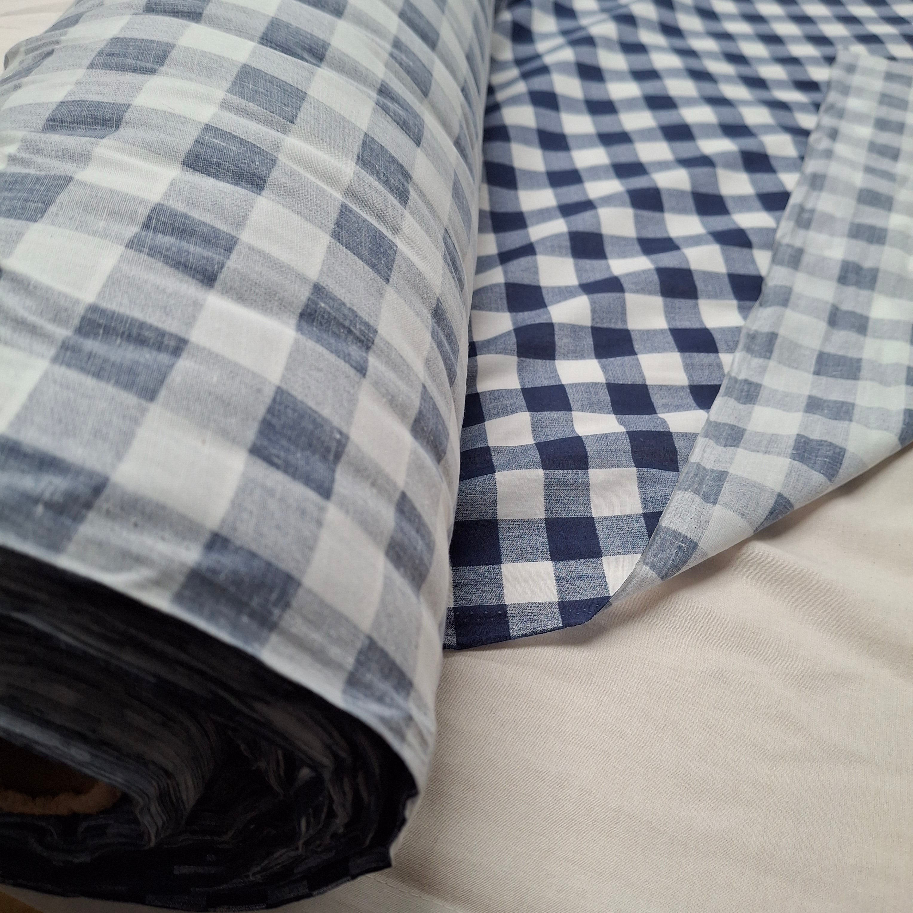 NEW Blue and White Polycotton Checked Fabric 145 cm wide

NEW cut from unused surplus roll 

Very lightweight curtain fabric weighs approx 48 grams per metre 

RRP £8.99 metre 

Selling at £3.5 metre 

Ideal for many sewing projects including curtains and